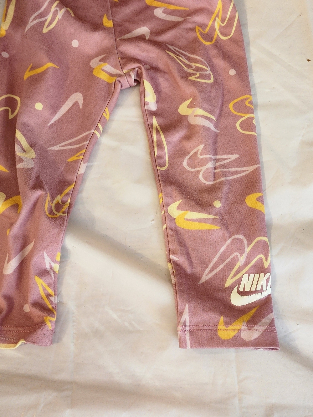 Nike Girls Mauve Pink Leggings with Yellow & Cream Swoosh Print